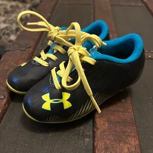 Under Armour cleats; size 8k